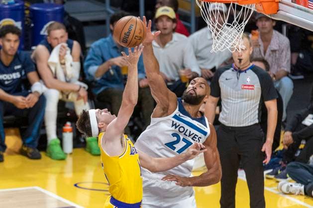 October 24, 2025, Los Angeles, California, USA: Minnesota Timberwolves Rudy Gobert (27) blocks a shot by Los Angeles LakersÃ¢â‚¬â ¢ Austin Reaves (15) during an NBA, Basketball Herren, USA basketball game, in Los Angeles Friday, Oct. 24, 2025. Los Angeles USA - ZUMAc68_ 20251024_zaf_c68_017 Copyright: xRingoxChiux