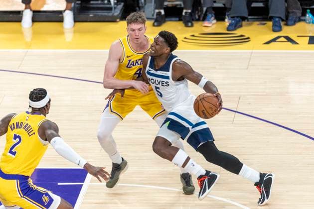 October 24, 2025, Los Angeles, California, USA: Minnesota Timberwolves Anthony Edwards (5) drives against Los Angeles LakersÃ¢â‚¬â ¢ Dalton Knecht (4) uring an NBA, Basketball Herren, USA basketball game, in Los Angeles Friday, Oct. 24, 2025. Los Angeles USA - ZUMAc68_ 20251024_zaf_c68_020 Copyright: xRingoxChiux