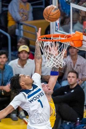 October 24, 2025, Los Angeles, California, USA: Los Angeles LakersÃ¢â‚¬â ¢ Luka DonÄÂiÄ¡ (77) goes to the basket under pressure from Minnesota Timberwolves Terrence Shannon Jr. (1) during an NBA, Basketball Herren, USA basketball game, in Los Angeles Friday, Oct. 24, 2025. Los Angeles USA - ZUMAc68_ 20251024_zaf_c68_021 Copyright: xRingoxChiux