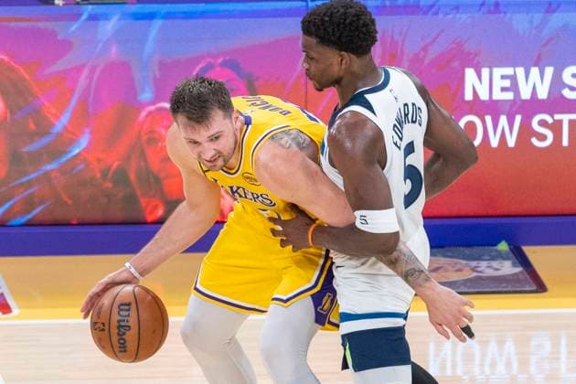 October 24, 2025, Los Angeles, California, USA: Los Angeles LakersÃ¢â‚¬â ¢ Luka DonÄÂiÄ¡ (77) is defended by Minnesota Timberwolves Anthony Edwards (5) during an NBA, Basketball Herren, USA basketball game, in Los Angeles Friday, Oct. 24, 2025. Los Angeles USA - ZUMAc68_ 20251024_zaf_c68_031 Copyright: xRingoxChiux