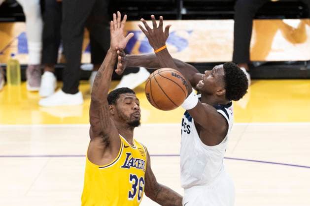 October 24, 2025, Los Angeles, California, USA: Minnesota Timberwolves Anthony Edwards (5) and Los Angeles LakersÃ¢â‚¬â ¢ Marcus Smart (36) vie for the ball during an NBA, Basketball Herren, USA basketball game, in Los Angeles Friday, Oct. 24, 2025. Los Angeles USA - ZUMAc68_ 20251024_zaf_c68_055 Copyright: xRingoxChiux