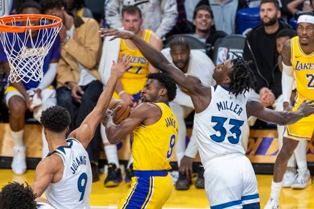 October 24, 2025, Los Angeles, California, USA: Los Angeles LakersÃ¢â‚¬â ¢ Bronny James (9) goes to the basket under pressure from Minnesota Timberwolves Johnny Juzang (9) and Leonard Miller (33) during an NBA, Basketball Herren, USA basketball game, in Los Angeles Friday, Oct. 24, 2025. Los Angeles USA - ZUMAc68_ 20251024_zaf_c68_061 Copyright: xRingoxChiux