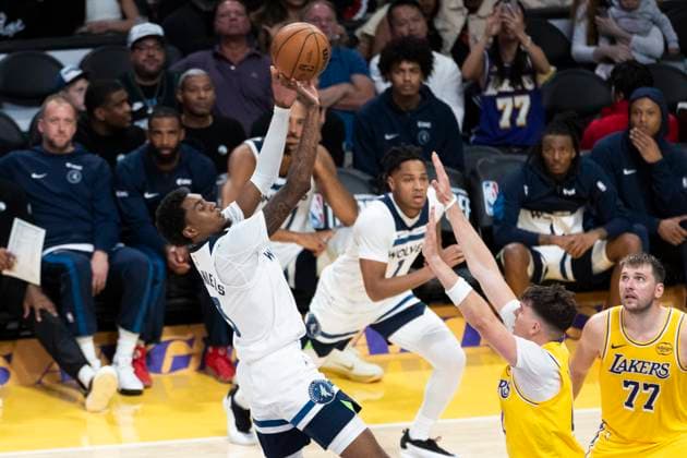 October 24, 2025, Los Angeles, California, USA: Minnesota Timberwolves Jaden McDaniels (3) shoots against Los Angeles LakersÃ¢â‚¬â ¢ Jake LaRavia (12) during an NBA, Basketball Herren, USA basketball game, in Los Angeles Friday, Oct. 24, 2025. Los Angeles USA - ZUMAc68_ 20251024_zaf_c68_062 Copyright: xRingoxChiux