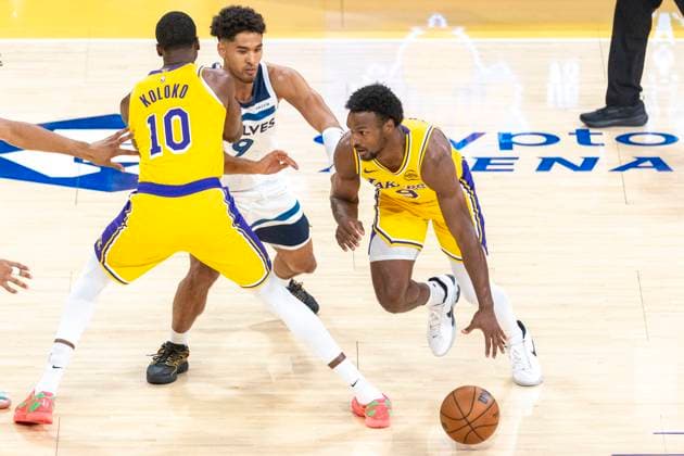 October 24, 2025, Los Angeles, California, USA: Los Angeles LakersÃ¢â‚¬â ¢ Bronny James (9) drives around a screen set by Christian Koloko (10) defended by Minnesota Timberwolves Johnny Juzang (9) during an NBA, Basketball Herren, USA basketball game, in Los Angeles Friday, Oct. 24, 2025. Los Angeles USA - ZUMAc68_ 20251024_zaf_c68_066 Copyright: xRingoxChiux