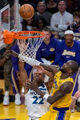 October 24, 2025, Los Angeles, California, USA: Minnesota Timberwolves Jaylen Clark (22) goes to the basket under pressure from Los Angeles LakersÃ¢â‚¬â ¢ Deandre Ayton (5) during an NBA, Basketball Herren, USA basketball game, in Los Angeles Friday, Oct. 24, 2025. Los Angeles USA - ZUMAc68_ 20251024_zaf_c68_068 Copyright: xRingoxChiux