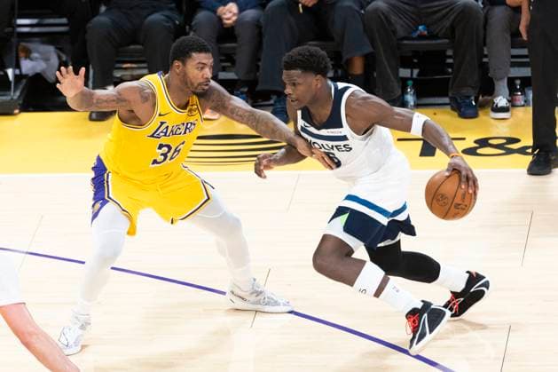 October 24, 2025, Los Angeles, California, USA: Minnesota Timberwolves Anthony Edwards (5) drives against Los Angeles LakersÃ¢â‚¬â ¢ Marcus Smart (36) during an NBA, Basketball Herren, USA basketball game, in Los Angeles Friday, Oct. 24, 2025. Los Angeles USA - ZUMAc68_ 20251024_zaf_c68_079 Copyright: xRingoxChiux