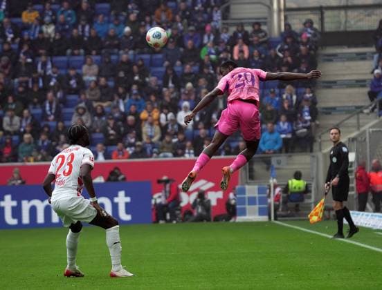 GER, 1.FBL, TSG Hoffenheim vs 1.FC Heidenheim 25.10.2025, PreZero Arena, Sinsheim, GER, 1.FBL, TSG Hoffenheim vs 1.FC Heidenheim , im Bild Omar Traore (Heidenheim), Bazoumana Toure (Hoffenheim) DFL regulations prohibit any use of photographs as image sequences and or quasi-video.