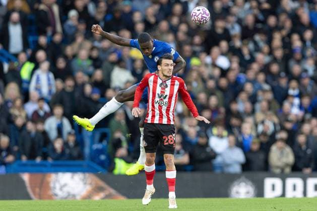 25th October 2025; Stamford Bridge, Chelsea, London, England: Premier League Football, Chelsea versus Sunderland; Trevoh Chalobah of Chelsea wins the ball in the air, beating Arthur Masuaku of Sunderland  IanxStephen