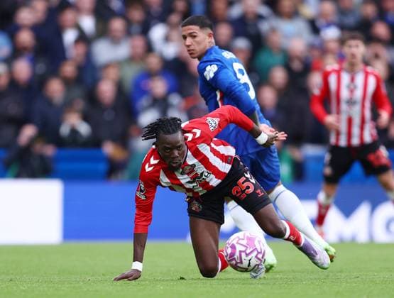 London, England, 25th October 2025. Enzo Fernandez of Chelsea tackled by Bertrand Traore of Sunderland during the Chelsea vs Sunderland Premier League match at Stamford Bridge, London. Picture credit should read: Paul Terry Sportimage EDITORIAL USE ONLY. No use with unauthorised audio, video, data, fixture lists, club league logos or live services. Online in-match use limited to 120 images, no video emulation. No use in betting, games or single club league player publications. SPI_032_PT_Chelsea_Sunderland SPI-4235-0033
