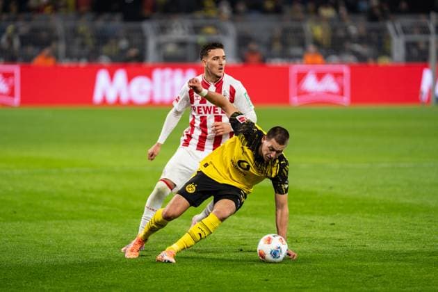 GER, 1. FBL, Borussia Dortmund vs 1.FC Köln 25.10.2025, Signal Iduna Park, Dortmund, GER, 1. FBL, Borussia Dortmund vs 1.FC Köln im Bild: Zweikampf zwischen Waldemar Anton (Borussia Dortmund, 3) und Said El Mala (1. FC Köln Koeln, 13)