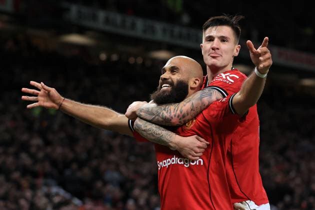 25th October 2025; Old Trafford, Manchester, England; Premier League Football, Manchester United, ManU versus Brighton and Hove Albion; Bryan Mbuemo of Manchester United celebrates with team mate Benjamin Sesko after scoring for 3-0 after 61 minutes  DavidxBlunsden