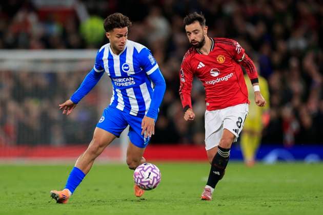 Manchester United, ManU v Brighton and Hove Albion Premier League 25 10 2025. Charalampos Kostoulas (19) of Brighton & Hove Albion runs from Bruno Fernandes (8) of Manchester United during the Premier League match between Manchester United and Brighton and Hove Albion at Old Trafford, Manchester, England on 25 October 2025. Manchester Old Trafford Greater Manchester England Editorial use only DataCo restrictions apply See www.football-dataco.com , Copyright: xConorxMolloyx PSI-23095-0103