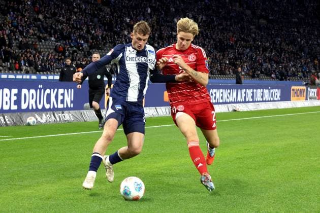 DEU, DFL, 2. FBL, Hertha BSC vs. Forrtuna Duesseldorf, 25.10.2025, Berliner Olympiastadion, Berlin, DEU, DFL, 2. FBL, Hertha BSC vs. Forrtuna Duesseldorf, im Bild Michael Cuisance (Hertha BSC Berlin 10), JESPER DALAND (Fortuna Duesseldorf 2) DFL - regulations prohibit any use of Photographs as image sequences and or quasi-video