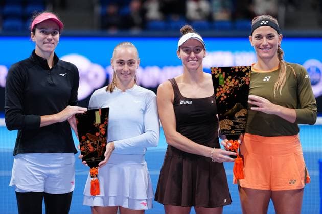 (251026) -- TOKYO, Oct. 26, 2025 -- Timea Babos (1st R) of Hungary Luisa Stefani (2nd R) of Brazil and Anna Danilina (1st L) of Kazakhstan Aleksandra Krunic of Serbia react during the awarding ceremony after their women s doubles final match at the Pan Pacific Open tennis tournament in Tokyo, Japan, on Oct. 26, 2025. ) (SP)JAPAN-TOKYO-TENNIS WTA, Tennis Damen PPO-WOMEN S DOUBLES-FINAL JiaxHaocheng 