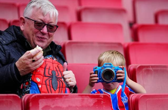 A young Crystal Palace fan photographs a photographer Arsenal v Crystal Palace, Premier League, Football, Emirates Stadium, London, UK - 26 Oct 2025London Emirates Stadium United Kingdom EDITORIAL USE ONLY No use with unauthorised audio, video, data, fixture lists, club league logos or live services. Online in-match use limited to 120 images, no video emulation. No use in betting, games or single club league player publications. Copyright: xJavierxGarcia Shutterstockx 15593463a