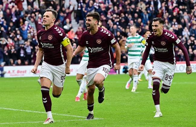 Lawrence Shankland of Heart of Midlothian celebrates scoring a penalty with his team mates Heart of Midlothian v Celtic, William Hill Scottish Premiership, Football, Tynecastle Park, Edinburgh, Scotland, UK - 26 Oct 2025Edinburgh Tynecastle Park United Kingdom EDITORIAL USE ONLY No use with unauthorised audio, video, data, fixture lists, club league logos or live services. Online in-match use limited to 120 images, no video emulation. No use in betting, games or single club league player publications.  Copyright: xMarkxRunnacles Shutterstockx 15593438de