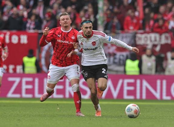 26.10.2025 - Fussball - Saison 2025 2026 - 2. Fussball - Bundesliga - 10. Spieltag: 1. FC Kaiserslautern FCK ( Lautern Roten Teufel ) - 1. FC Nürnberg FCN ( Club ) - Sportfoto Zink DaMa - xdaxmax - DFL regulations prohibit any use of photographs as image sequences and or quasi-video - only for editorial use - Marlon Ritter (7, 1. FC Kaiserslautern FCK ) Berkay Yilmaz (21, 1. FC Nürnberg FCN )