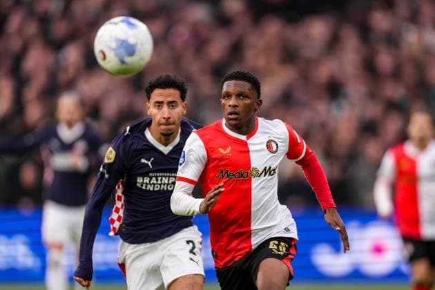 2025-10-26 Feyenoord v PSV - Dutch Eredivisie ROTTERDAM, NETHERLANDS - OCTOBER 26: Givairo Read of Feyenoord battles for possession with Anass Salah-Eddine of PSV during the Dutch Eredivisie match between Feyenoord and PSV at Stadion Feijenoord on October 26, 2025 in Rotterdam, Netherlands. Rotterdam Stadion Feijenoord Netherlands Content not available for redistribution in The Netherlands directly or indirectly through any third parties. Copyright: xJorisxVerwijstx