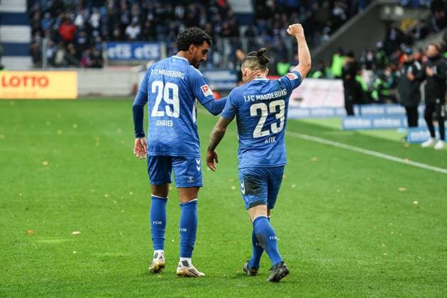 Torjubel - Torschütze Rayan Ghrieb (1. FC Magdeburg,29) trifft zum 2-0 mit Baris Atik (1. FC Magdeburg,23) - 2. Fußball Bundesliga Saison 2025-2026 1. FC Magdeburg vs. Preussen Münster in der Avnet Arena in Magdeburg - Aktion,Fußball,Mann,Männer,Deutschland,26.10.2025
