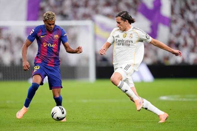 Real Madrid CF v FC Barcelona, Barca - LaLiga EA Sports Lamine Yamal right winger of Barcelona and Spain and Alvaro Carreras left-back of Real Madrid and Spain compete for the ball during the La Liga EA Sports match between Real Madrid CF and FC Barcelona at Estadio Santiago Bernabeu on October 26, 2025 in Madrid, Spain. Madrid Spain  Copyright: xJosexBretonx originalFilename:bretonhernandez-realmadr251026_npCJU.jpg