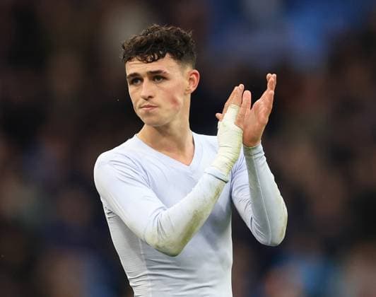 Birmingham, England, 26th October 2025. Phil Foden of Manchester City applauds the fans during the Aston Villa vs Manchester City Premier League match at Villa Park, Birmingham. Picture credit should read: Jessica Hornby Sportimage EDITORIAL USE ONLY. No use with unauthorised audio, video, data, fixture lists, club league logos or live services. Online in-match use limited to 120 images, no video emulation. No use in betting, games or single club league player publications. SPI_069_JH_Villa_City SPI-4240-0069