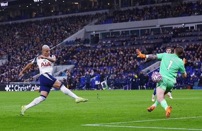 Everton goalkeeper Jordan Pickford makes a save from Richarlison of Tottenham Hotspur Everton v Tottenham Hotspur, Premier League, Football, Hill Dickinson Stadium, Liverpool, UK - 26 Oct 2025Liverpool Hill Dickinson Stadium United Kingdom EDITORIAL USE ONLY No use with unauthorised audio, video, data, fixture lists, club league logos or live services. Online in-match use limited to 120 images, no video emulation. No use in betting, games or single club league player publications. Copyright: xMattxWest Shutterstockx 15593518ab