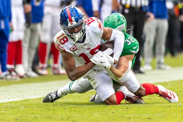 New York Giants wide receiver Darius Slayton (18) is brought down at the 39 yard line by Philadelphia Eagles safety Reed Blankenship (32) for a third down in the second quarter at Lincoln Financial Field in Philadelphia on Sunday, October 26, 2025.  PHI20251026008 LAURENCExKESTERSON