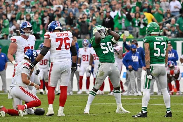 October 26, 2025, Philadelphia, Pennsylvania, USA; Philadelphia Eagles linebacker Jalyx Hunt (58) and linebacker Zack Baun (53) react to sacking New York Giants quarterback Jaxson Dart (6) during the second half at Lincoln Financial Field. CSM Philadelphia USA - ZUMAc04_ 20251026_faf_c04_059 Copyright: xEricxCanhax