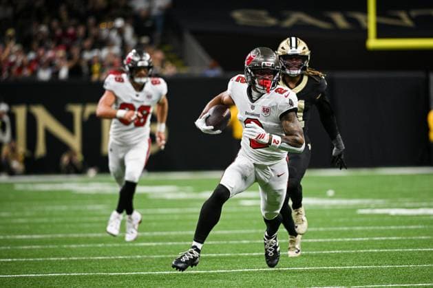 Tampa Bay Buccaneers receiver Emeka Egbuka (2) runs with the football on a reception during the first half of an NFL, American Football Herren, USA game against the New Orleans Saints at the Caesars Superdome in New Orleans, LA, on Sunday, October 26, 2025.  NOP20250914101c PaulxKieu
