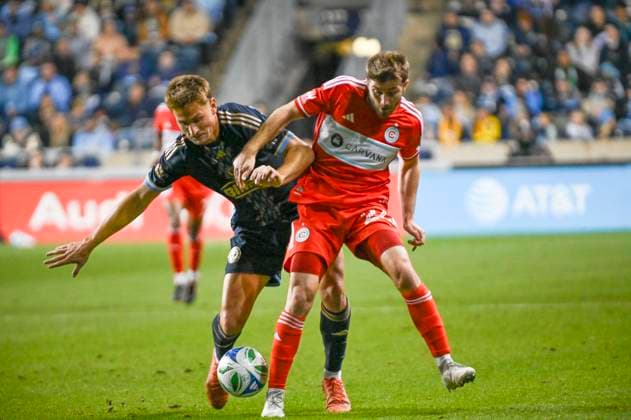 October 26, 2025, Chester, Pennsylvania, United States: Philadelphia Union player, forward BRUNO DAMIANI (20) in action against Chicago Fire player, JONATHAN DEAN (24) during their playoff match at Subaru Park in Chester PA Chester United States - ZUMArf1_ 20251026_zaf_rf1_006 Copyright: xRickyxFitchettx
