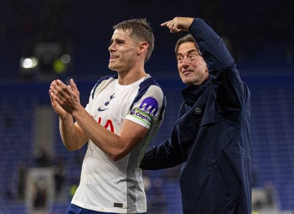 (251027) -- LIVERPOOL, Oct. 27, 2025 -- Tottenham Hotspur s Micky van de Ven (L) celebrates with head coach Thomas Frank after the English Premier League match between Everton FC and Tottenham Hotspur FC in Liverpool, Britain, on Oct. 26, 2025. FOR EDITORIAL USE ONLY. NOT FOR SALE FOR MARKETING OR ADVERTISING CAMPAIGNS. NO USE WITH UNAUTHORIZED AUDIO, VIDEO, DATA, FIXTURE LISTS, CLUB LEAGUE LOGOS OR LIVE SERVICES. ONLINE IN-MATCH USE LIMITED TO 45 IMAGES, NO VIDEO EMULATION. NO USE IN BETTING, GAMES OR SINGLE CLUB LEAGUE PLAYER PUBLICATIONS. (SP)BRITAIN-LIVERPOOL-FOOTBALL-PREMIER LEAGUE-EVERTON VS TOTTENHAM HOTSPUR (Xinhua)
