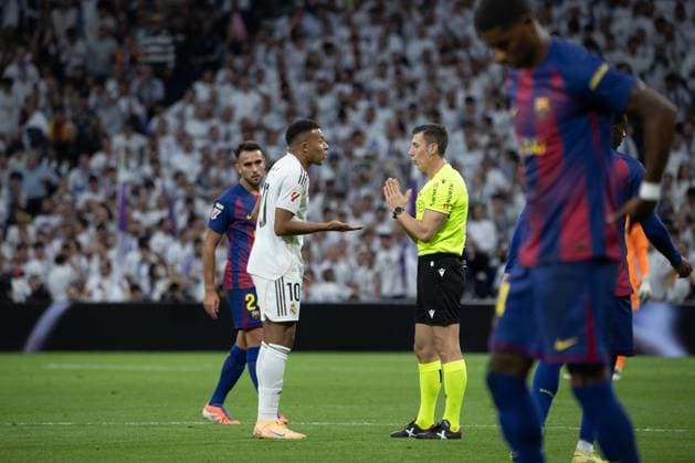 October 26, 2025, Madrid, Spain: Kylian MbappÃ (10) of Real Madrid seen in action EA SPORTS La Liga 2025-2026 match between Real Madrid and FC Barcelona, Barca ??played at the Santiago BernabÃ u Stadium. .Final score: Real Madrid 2 - 1 FC Barcelona Madrid Spain - ZUMAs197 20251026_aaa_s197_296 Copyright: xDavidxCanalesx