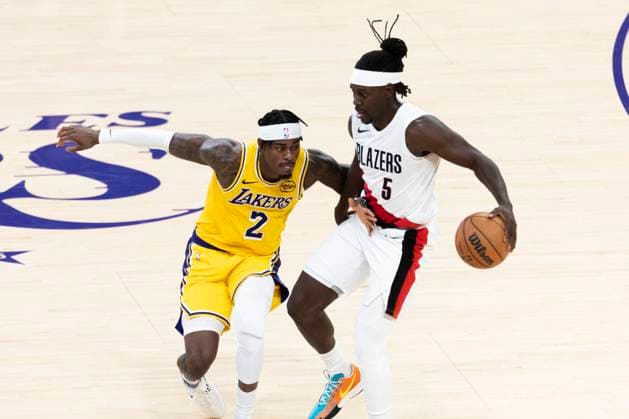 October 27, 2025, Los Angeles, California, USA: Portland Trail Blazers Jrue Holiday (5) drives against Los Angeles LakersÃ¢â‚¬â ¢ Jarred Vanderbilt (2) during an NBA, Basketball Herren, USA basketball game, in Los Angeles Monday, Oct. 27, 2025. Los Angeles USA - ZUMAc68_ 20251027_zaf_c68_006 Copyright: xRingoxChiux