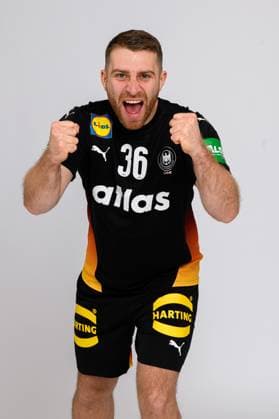 Muenchen: Handball DHB - 25 26 - Deutschland - Fotoshooting Lukas Mertens (Deutschland) Jubel Freude Emotion Muenchen Bayern Deutschland