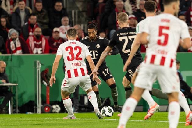 GER, DFB-Pokal 2. Runde, 1. FC Köln vs FC Bayern München Muenchen 29.10.2025, RheinEnergieSTADION, Köln, GER, DFB-Pokal 2. Runde, 1. FC Köln vs FC Bayern München Muenchen im Bild: Zweikampf zwischen Michael Olise (FC Bayern München Muenchen, 17) und Kristoffer Lund (1. FC Köln Koeln, 32)