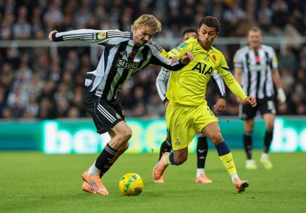 Newcastle Upon Tyne, England, 29th October 2025. Nick Waltemade of Newcastle United in action with Brennan Johnson of Tottenham Hotspur during the Newcastle United vs Tottenham Hotspur Carabao Cup match at St. James Park, Newcastle Upon Tyne. Picture credit should read: Nigel Roddis Sportimage EDITORIAL USE ONLY. No use with unauthorised audio, video, data, fixture lists, club league logos or live services. Online in-match use limited to 120 images, no video emulation. No use in betting, games or single club league player publications. SPI_031_NR_NEWC_TOTE SPI-4248-0031