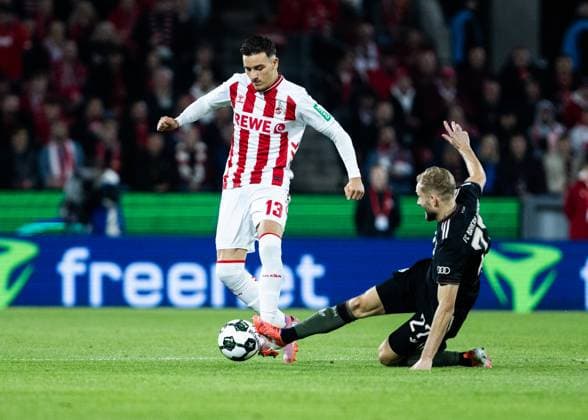Koeln, RheinEnergieStadion, 29.10.2025: Said El Mala of Koeln challenges Konrad Laimer of Muenchen during the second round DFB Cup match between 1.FC Koeln vs. FC Bayern Muenchen.