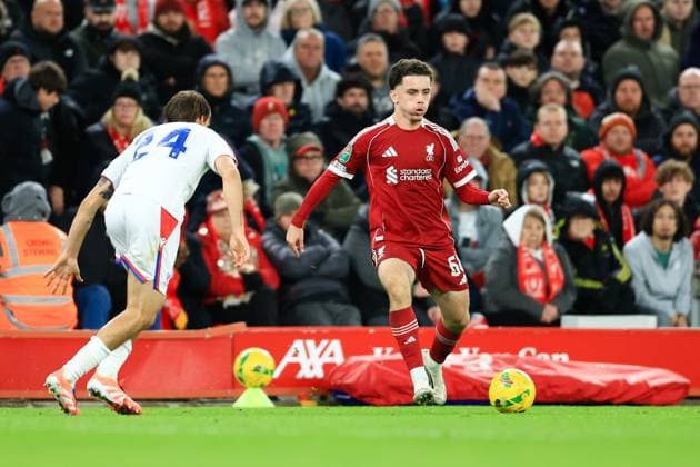 Liverpool, England, 29th October 2025. Kieron Morrison of Liverpool runs with the ball whilst under pressure from Borna Sosa of Crystal Palace during the Liverpool vs Crystal Palace Carabao Cup match at Anfield, Liverpool. Picture credit should read: Jessica Hornby Sportimage EDITORIAL USE ONLY. No use with unauthorised audio, video, data, fixture lists, club league logos or live services. Online in-match use limited to 120 images, no video emulation. No use in betting, games or single club league player publications. SPI_044_JH_Liverpool_Crystal_Palace SPI-4246-0044