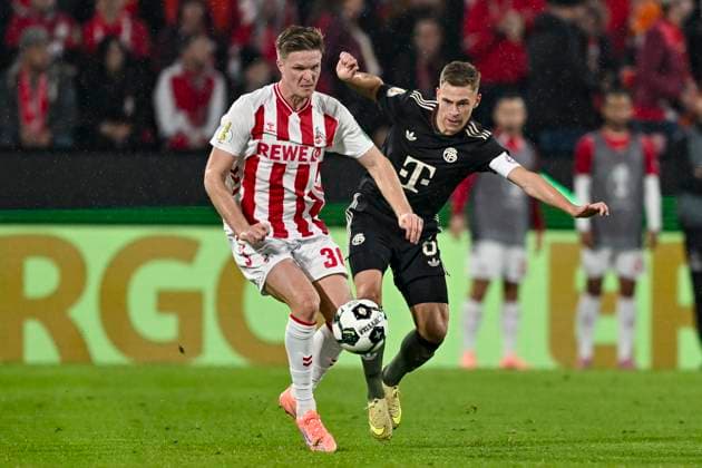 v. li. im Zweikampf Marius Bülter Buelter (Koeln 30) Joshua Kimmich (Muenchen 6) 29.10.2025 Fussball 1. FC Koeln vs FC Bayern Muenchen, Rheinenergiestadion, Koeln, DFB DFL REGULATIONS PROHIBIT ANY USE OF PHOTOGRAPHS AS IMAGE SEQUENCES AND OR QUASI-VIDEO