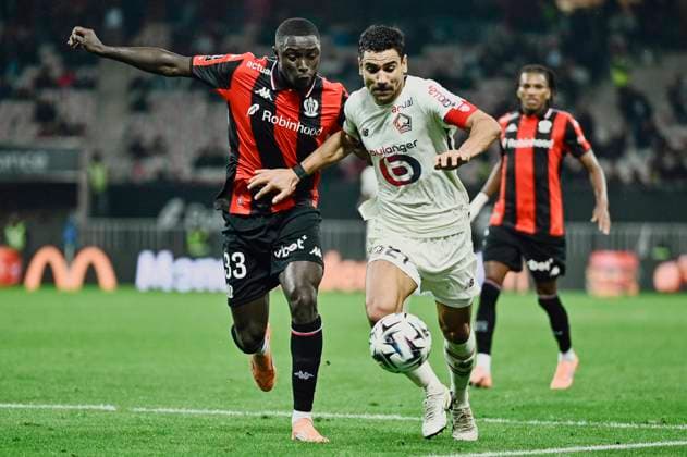 FOOTBALL : OGC Nice vs LOSC Lille - ligue 1 - 29 10 25 Nice™s defender 33 Antoine Mendy and Lille™s midfielder 27 FÃ lix Correia during the French L1 2025-2026 season football match between OGC Nice and LOSC Lille at Louis II stadium of Monaco, south France, on October 29, 2025. NICEFrance  Copyright: xfredxDIDES psnewzx