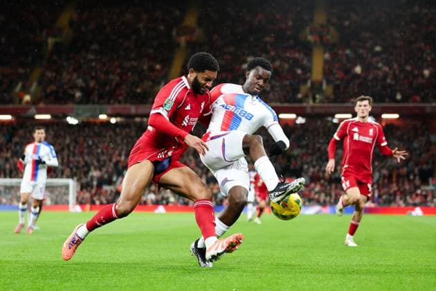 Liverpool, England, 29th October 2025. Eddie Nketiah of Crystal Palace is challenged by Joe Gomez of Liverpool during the Liverpool vs Crystal Palace Carabao Cup match at Anfield, Liverpool. Picture credit should read: Jessica Hornby Sportimage EDITORIAL USE ONLY. No use with unauthorised audio, video, data, fixture lists, club league logos or live services. Online in-match use limited to 120 images, no video emulation. No use in betting, games or single club league player publications. SPI_060_JH_Liverpool_Crystal_Palace SPI-4246-0060