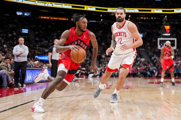 October 29, 2025, Toronto, On, Canada: Toronto Raptors guard Immanuel Quickley (5) drives the ball Padt Houston Rockets center Steven Adams (12) during the second half of preseason NBA, Basketball Herren, USA basketball action in Toronto, Wednesday, Oct. 29, 2025. Steven Adams, Immanuel Quickley - ZUMAc35_ 20251029_zaf_c35_171 Copyright: xThomasxSkrljx