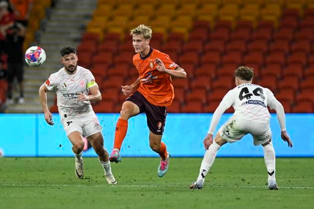 31st October 2025; Suncorp Stadium, Brisbane, Queensland, Australia: A League Football, Brisbane Roar versus Melbourne City; Sam Klein of Brisbane Roar clears the ball as Matthew Leckie aand Kutleshi of Melbourne City close in  NigelxOwen Content restricted for UK based newspaper