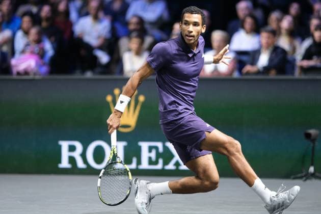 October 31, 2025, Nanterre, Hauts De Seine, France: FELIX AUGER ALIASSIME (CAN) returns the ball to VALENTIN VACHEROT (MON) during the quarter final of Rolex Paris Masters 1000 tournament at La Defense Arena Stadium - Nanterre - France..Auger Aliassime won 6:2 6:2 Nanterre France - ZUMAp119 20251031_zaf_p119_036 Copyright: xPierrexSteveninx