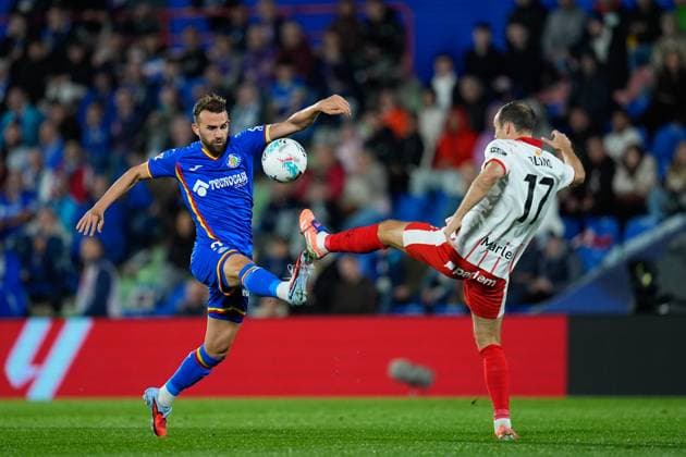 October 31, 2025, Getafe, Madrid, Spain: Borja Mayoral of Getafe CF and Daley Blind of Girona FC compete for the ball during the Spanish League, LaLiga EA Sports, football match played between Getafe CF and Girona FC at Coliseum de Getafe stadium on October 31, 2025, in Getafe, Spain. Getafe Spain - ZUMAa181 20251031_zaa_a181_104 Copyright: xDennisxAgyemanx