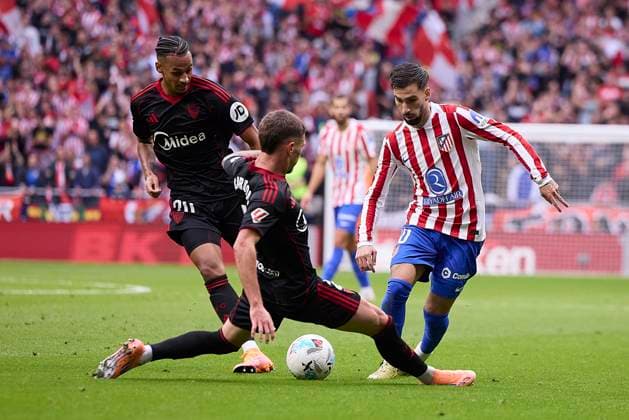 Alex Baena (Atletico de Madrid) and Jose Angel Carmona (Sevilla FC) battle for the ball during the LaLiga EA Sports match between AtlÃ tico Madrid v Sevilla FC at Estadio Riyadh Air Metropolitano on November 1, 2025 in Madrid, Spain. (Photo by Manu Reino DeFodi Images) Alex Baena Atletico de Madrid and Jose Angel Carmona Sevilla FC battle for the ball during the LaLiga EA Sports match between AtlÃ tico Madrid v Sevilla FC at Estadio Riyadh Air Metropolitano on November 1, 2025 in Madrid, Spain Photo by Manu Reino DeFodi Images