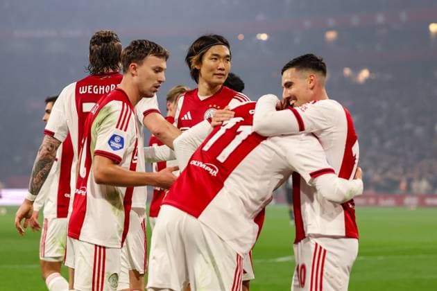 2025-11-01 Ajax v sc Heerenveen - Dutch Eredivisie AMSTERDAM, NETHERLANDS - NOVEMBER 1: Mika Godts of AFC Ajax celebrates after scoring his teams first goal with Raul Moro of AFC Ajax during the Dutch Eredivisie match between Ajax and sc Heerenveen at Johan Cruijff ArenA on November 1, 2025 in Amsterdam, Netherlands. Amsterdam Johan Cruijff ArenA Netherlands Content not available for redistribution in The Netherlands directly or indirectly through any third parties. Copyright: xBenxGalx