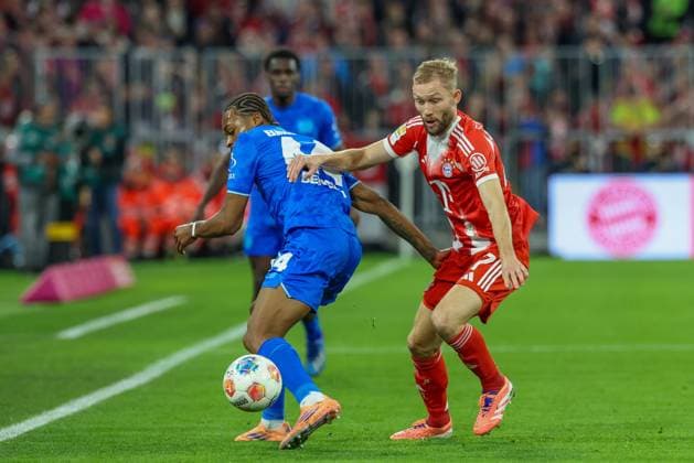 im Zweikampf, Aktion, mit Jeanuel Belocian 44 (Bayer 04 Leverkusen), Konrad Laimer 27 (FC Bayern Muenchen), FC Bayern Muenchen vs. Bayer 04 Leverkusen, Fussball, 1. Bundesliga, 9. Spieltag, 01.11.2025 DFB regulations prohibit any use of photographs as image sequences and or quasi-video Muenchen Bayern Deutschland