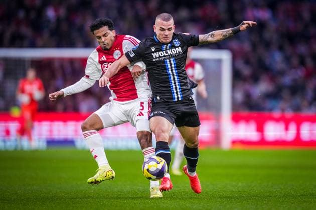 AMSTERDAM , 01-11-2025 , JohanCruyff Arena , season 2025 2026 , Dutch Eredivisie football , match between Ajax and sc Heerenveen , picture shows Ajax player Owen Wijndal and SC Heerenveen player Vaclav Sejk Ajax - Heerenveen  x31798665x Copyright: