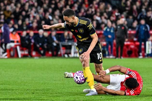 1st November 2025; The City Ground, Nottingham, England; Premier League Football, Nottingham Forest versus Manchester United, ManU Dan Ndoye of Nottingham Forest tackles Matheus Cunha of Manchester United  GodfreyxPitt